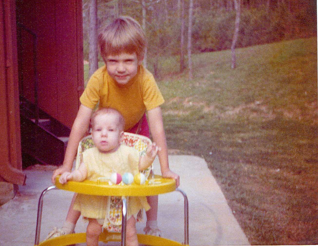 Keith & Sharon-Being pushed in walker.